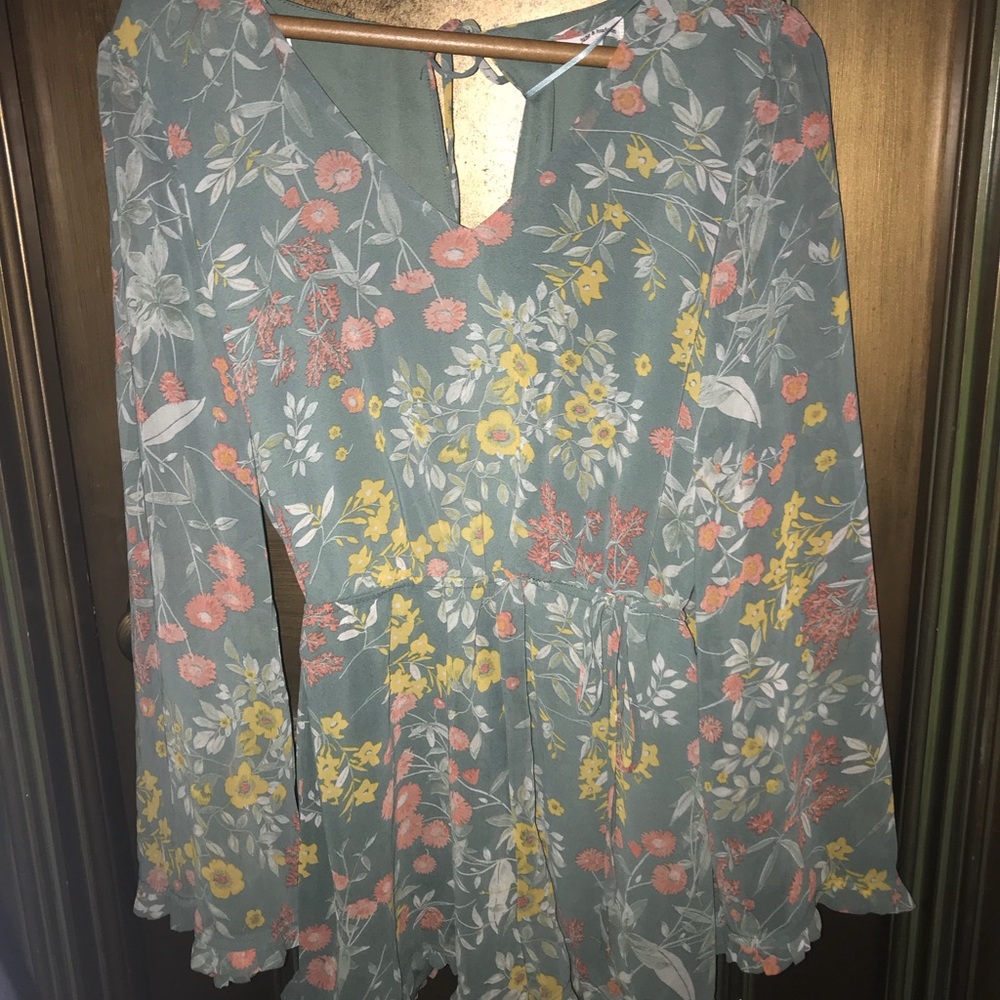 Floral romper with open back detail